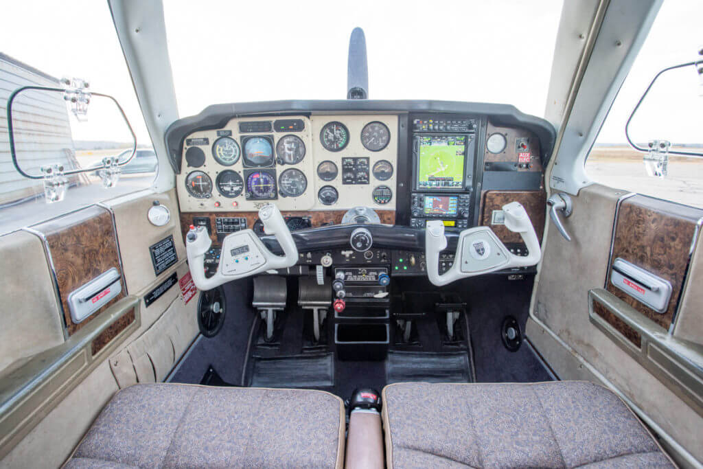 1976 Beechcraft Bonanza instrument panel and seats.